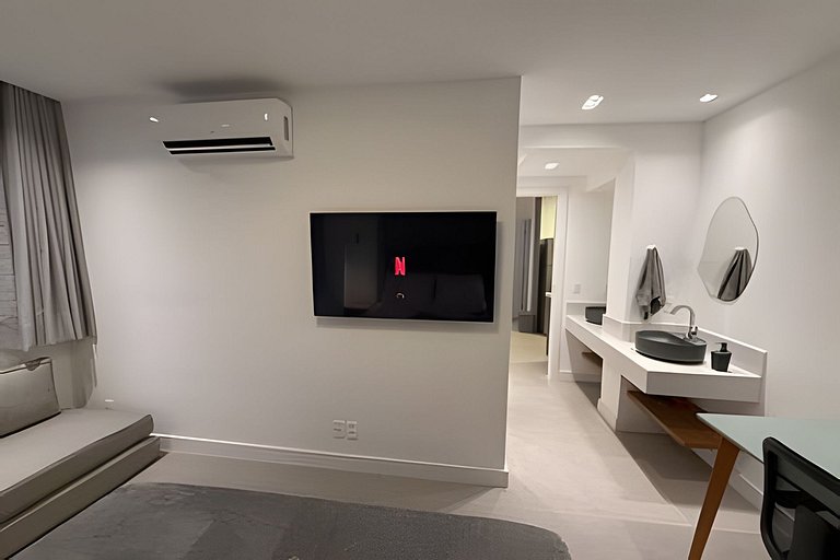 Apartamento NOVO a menos de 100 metros da praia!