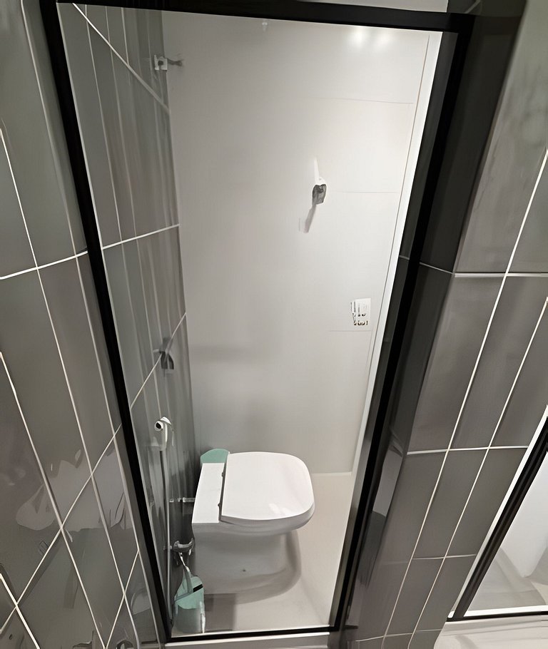 Apartamento NOVO a menos de 100 metros da praia!