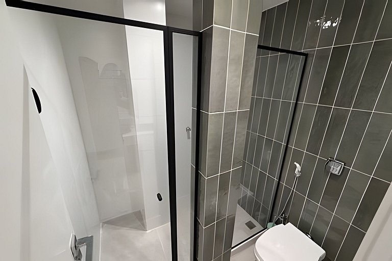 Apartamento NOVO a menos de 100 metros da praia!