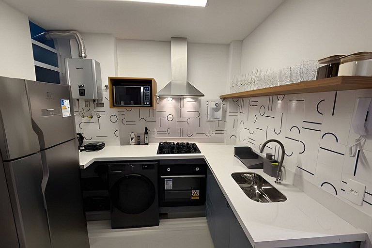 Apartamento NOVO a menos de 100 metros da praia!